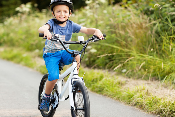 how to teach someone to ride a bike without training wheels